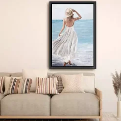 Coastal Woman in White Framed Canvas Art Print