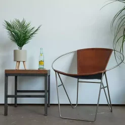 Palm Arrangement in Tan Footed Pot