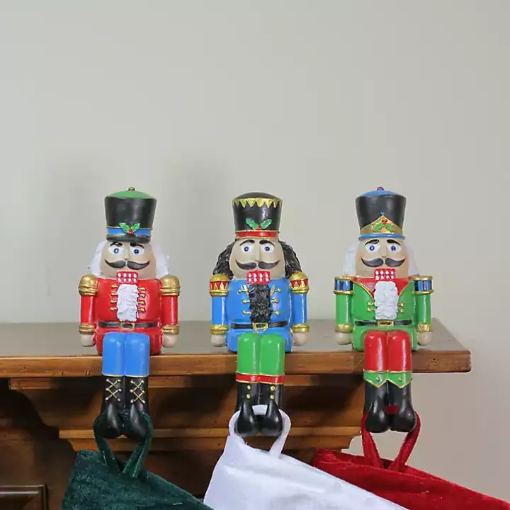 Sitting Nutcrackers Stocking Holders, Set of 3